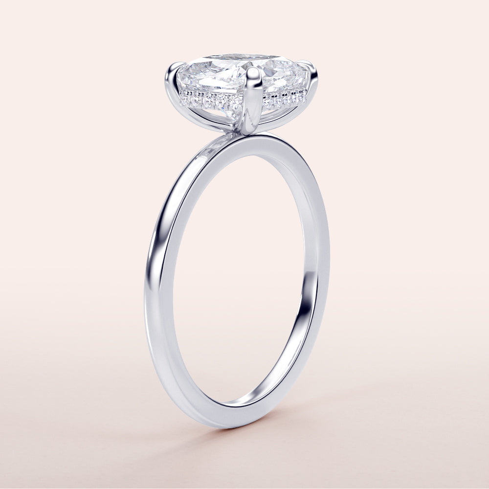 Elegant 14K White Gold Cushion Hidden Halo Engagement Ring with Oval Diamond, Not Worn on Model.|
#14KRecycledWhiteGold
#18KRecycledWhiteGold
#Platinum