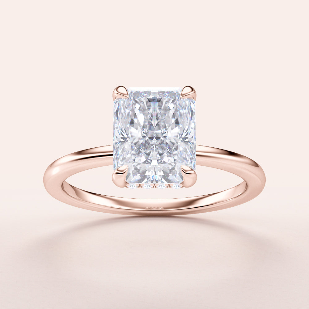 Elegant rose gold radiant cut diamond engagement ring, available in 14K, 18K, and platinum options.|
#14KRecycledRoseGold
#18KRecycledRoseGold