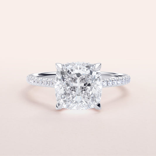 Elegant 14K/18K gold or platinum cushion cut diamond engagement ring withPave band, showcasing a hidden halo design.