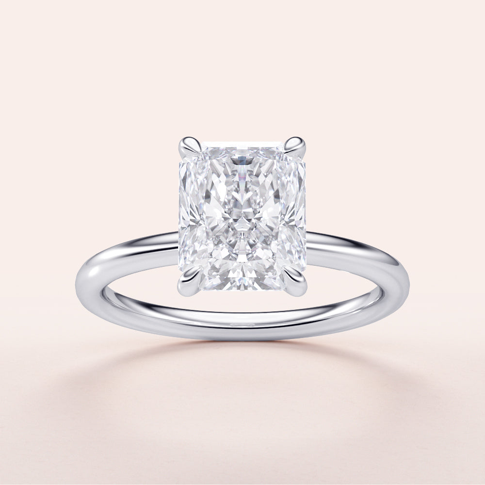 Radiant cut diamond engagement ring in 14K/18K white gold or platinum, shown unworn, perfect for timeless elegance.|
#14KRecycledWhiteGold
#18KRecycledWhiteGold
#Platinum