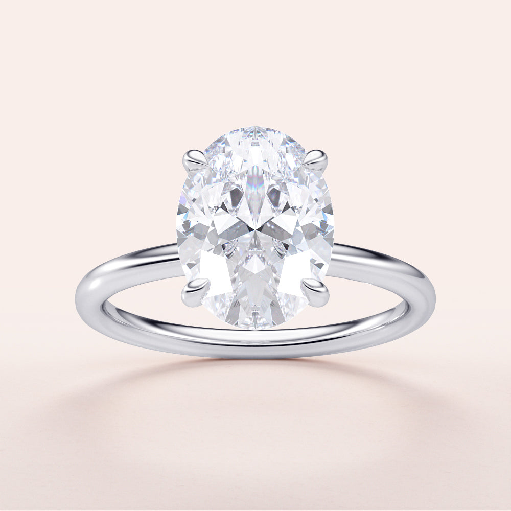 Elegant 14K White Gold Oval Classic Solitaire Engagement Ring Featuring a Stunning Diamond. Perfect for Proposals!|
#14KRecycledWhiteGold
#18KRecycledWhiteGold
#Platinum