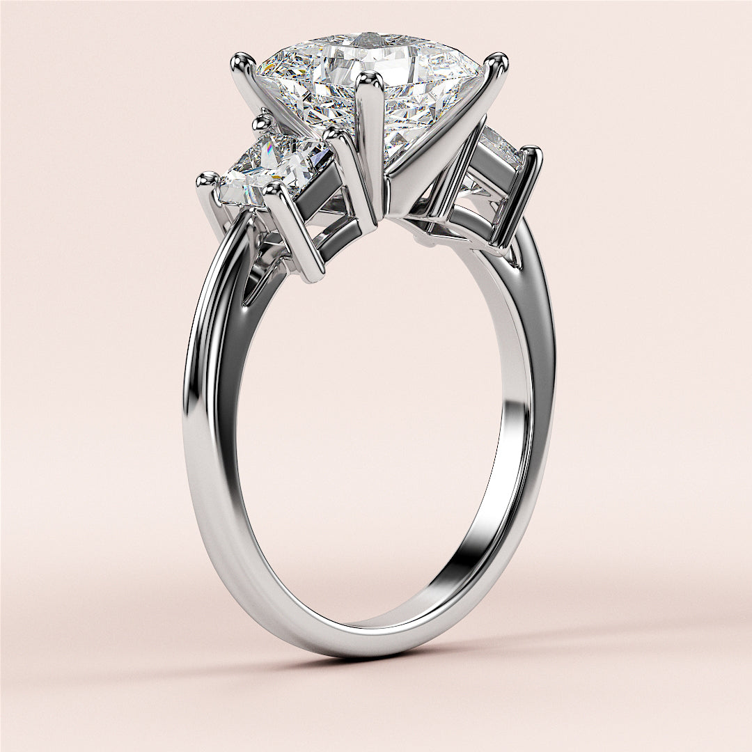 "Elegant 14K white gold three-stone engagement ring with pear-shaped diamond and two accent diamonds, perfect for timeless romance."|
#14KRecycledWhiteGold
#18KRecycledWhiteGold
#Platinum