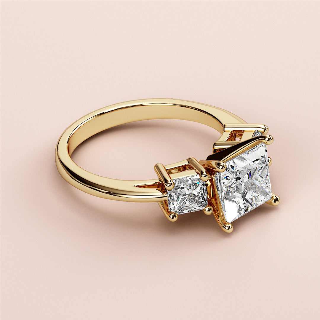 Elegant two-stone engagement ring with square-cut diamonds, crafted in 14K or 18K yellow gold or platinum.|
#14KRecycledYellowGold
#18KRecycledYellowGold
