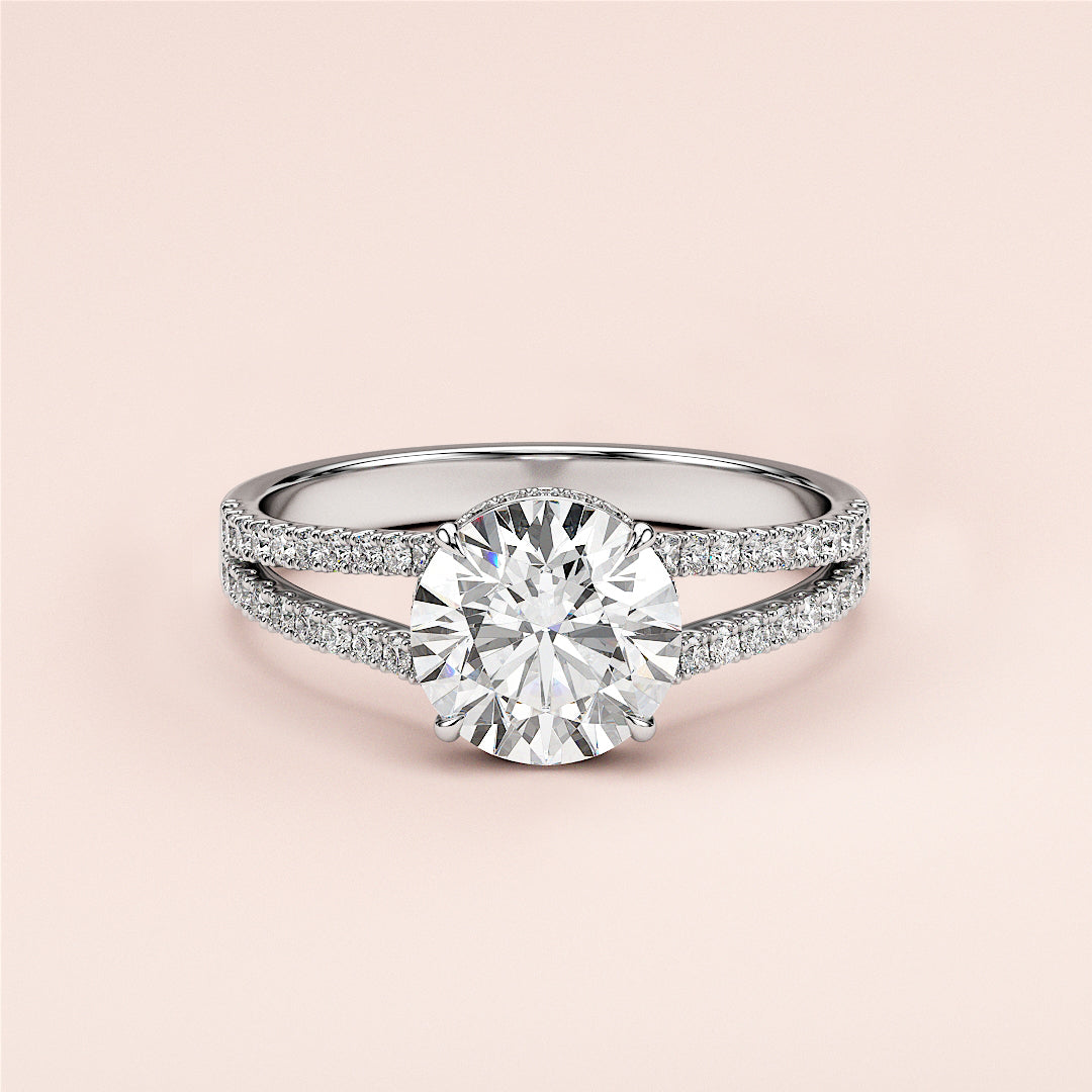 Elegant 14K/18K white gold engagement ring with round brilliant cut, split shank band, andPave diamonds. Perfect for your proposal!|
#14KRecycledWhiteGold
#18KRecycledWhiteGold
#Platinum