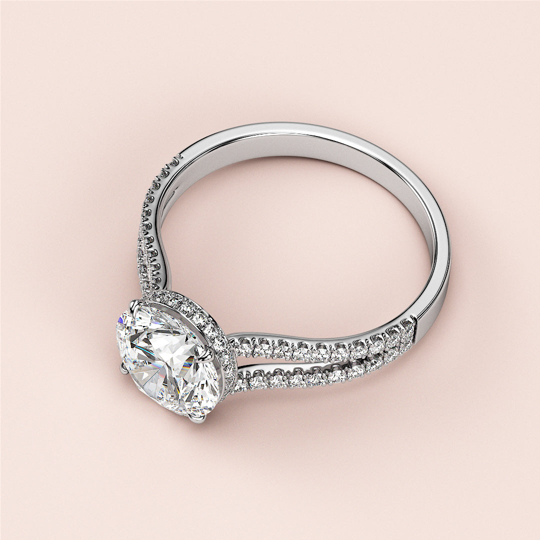 Elegant 14K or 18K white gold engagement ring with oval diamond center and pave diamond split shank band.|
#14KRecycledWhiteGold
#18KRecycledWhiteGold
#Platinum