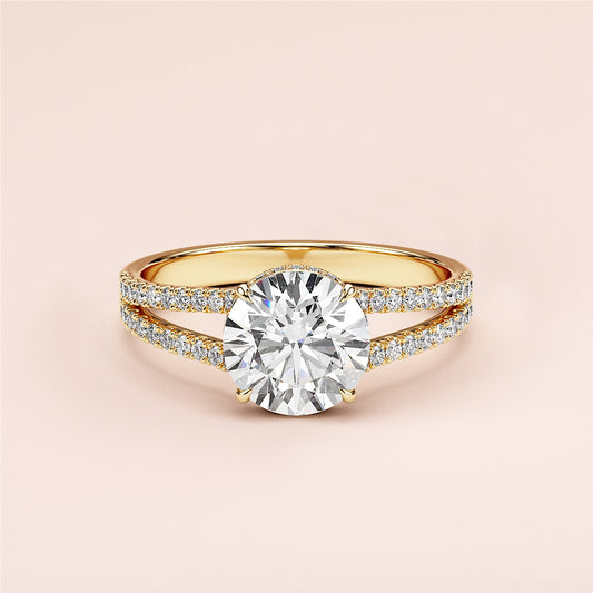 Elegant 14K or 18K yellow gold round diamond engagement ring with split shank band and pave-set diamonds, perfect for proposals.