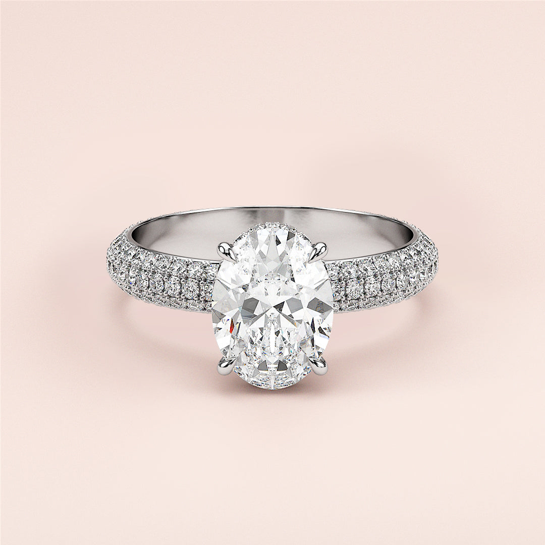 Elegant oval cut diamond engagement ring in white gold, featuring a multi-rowPave band and hidden halo accents. Not worn on model.|
#14KRecycledWhiteGold
#18KRecycledWhiteGold
#Platinum
