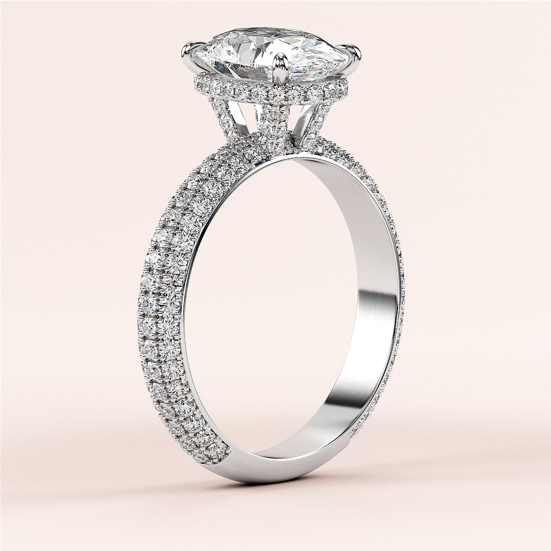 Elegant 14K white gold engagement ring featuring an oval diamond with hidden halo accents andPave diamonds, showcasing timeless beauty.|
#14KRecycledWhiteGold
#18KRecycledWhiteGold
#Platinum