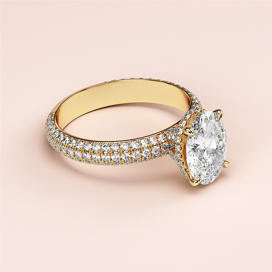 Elegant oval-cut diamond engagement ring in 14K yellow gold setting withPave accents and hidden halo design.|
#14KRecycledYellowGold
#18KRecycledYellowGold