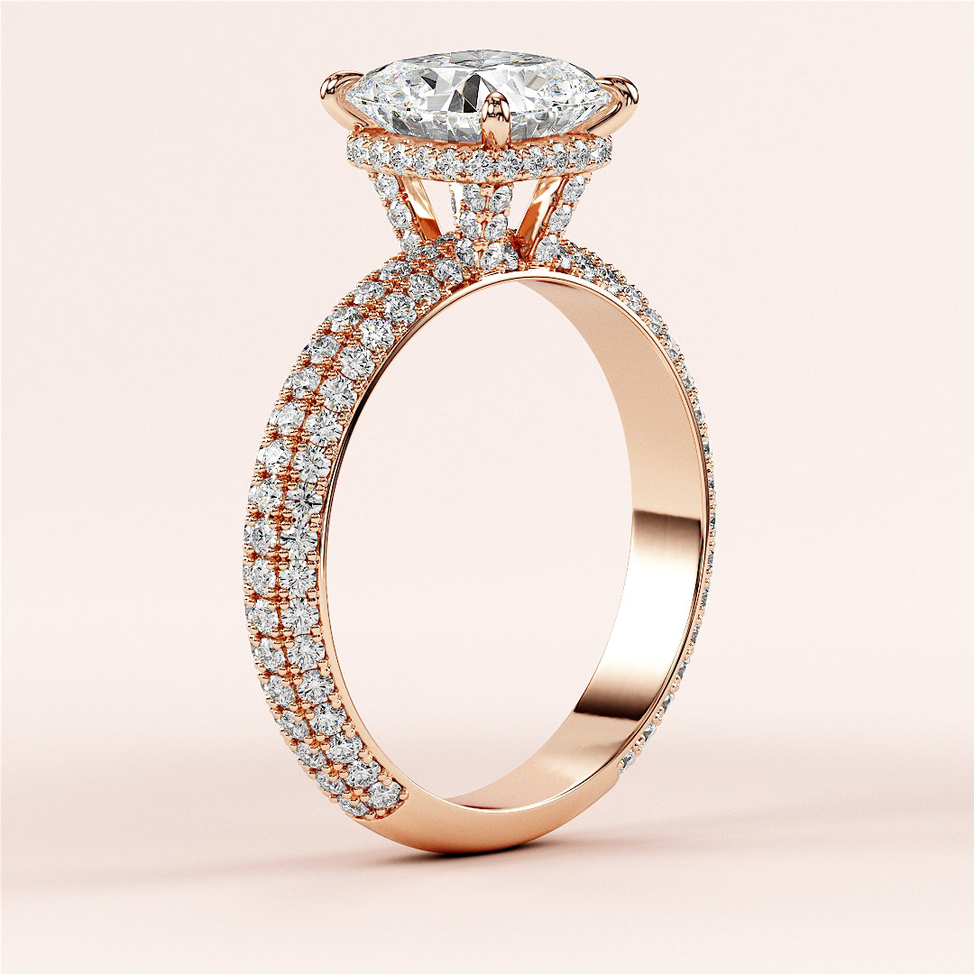Elegant 14K rose gold engagement ring featuring a cushion cut and hidden halo, encrusted withPave-set diamonds for stunning sparkle.|
#14KRecycledRoseGold
#18KRecycledRoseGold
