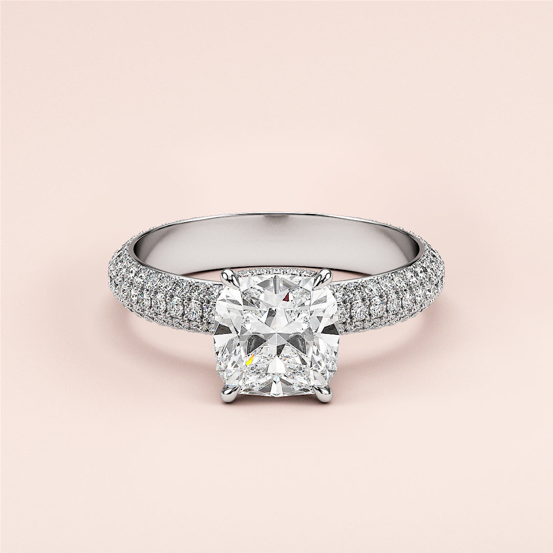Elegant 14K white gold cushion-cut diamond engagement ring with pave-set band, hidden halo accents for a timeless look.|
#14KRecycledWhiteGold
#18KRecycledWhiteGold
#Platinum