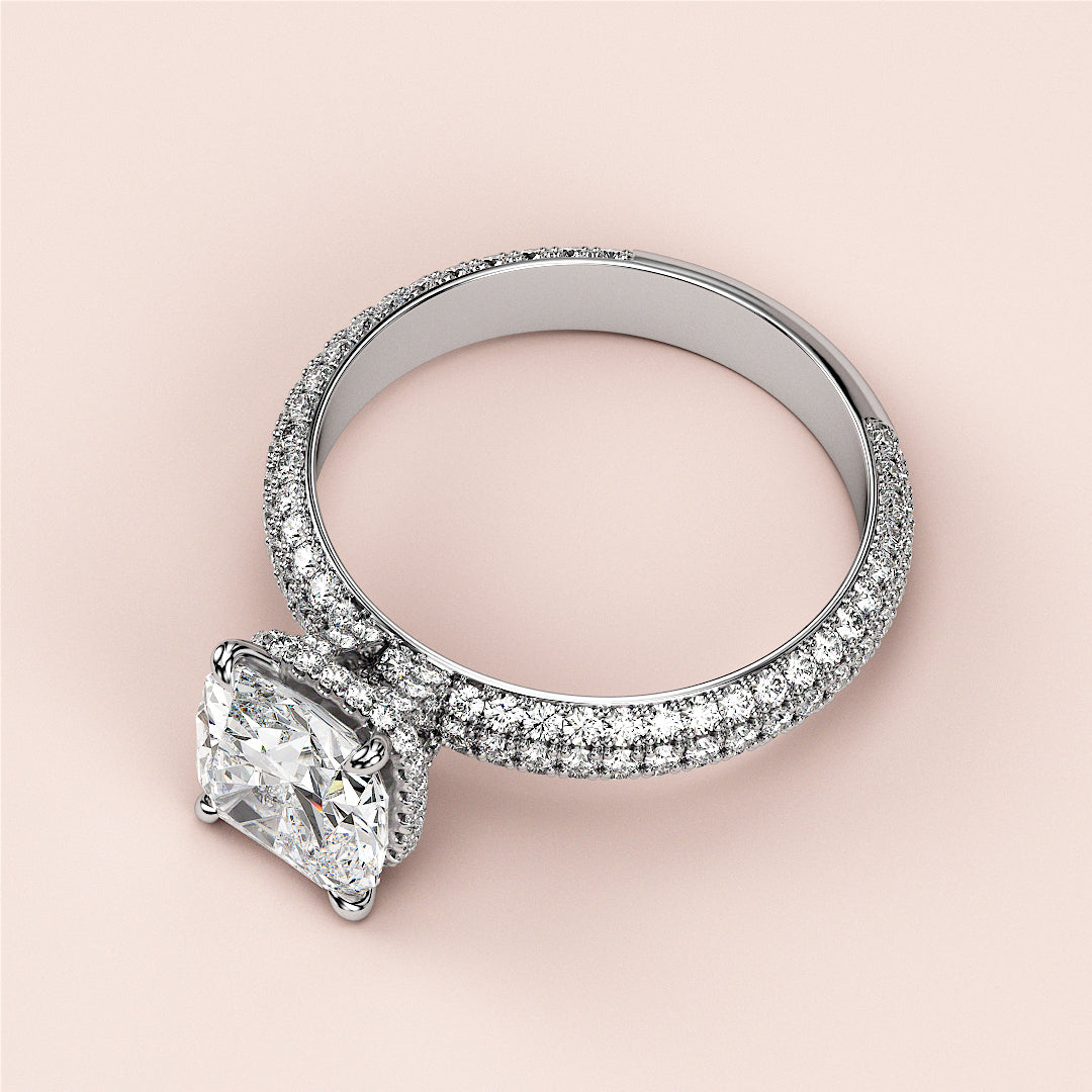 Elegant 14K/18K white gold cushion-cut diamond engagement ring withPave band, showcasing fine craftsmanship and shimmering brilliance.|
#14KRecycledWhiteGold
#18KRecycledWhiteGold
#Platinum