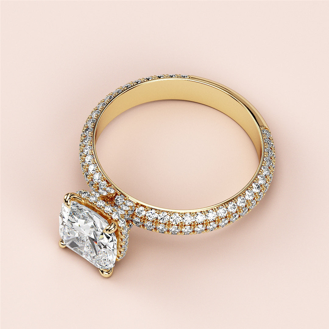 Elegant 14K/18K engagement ring with a cushion-cut diamond and pave-set band, exuding timeless sophistication and brilliance.|
#14KRecycledYellowGold
#18KRecycledYellowGold