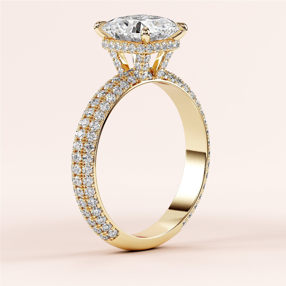 Elegant 14K yellow gold engagement ring with marquise-cut diamond, enhanced by pave-set round diamonds for a timeless look.|
#14KRecycledYellowGold
#18KRecycledYellowGold