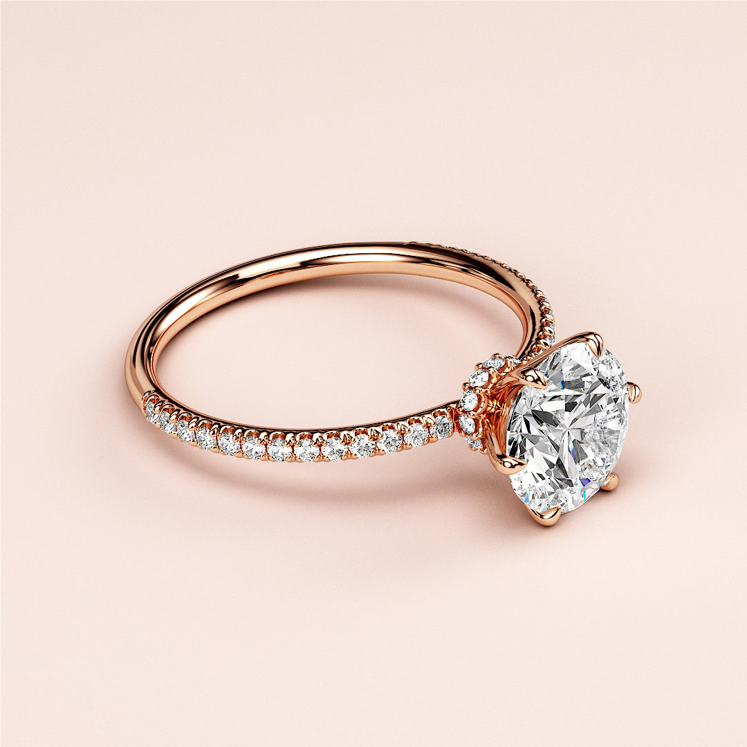Elegant rose gold engagement ring featuring a round-cut diamond in aPave setting, available in 14K, 18K, and platinum options.|
#14KRecycledRoseGold
#18KRecycledRoseGold