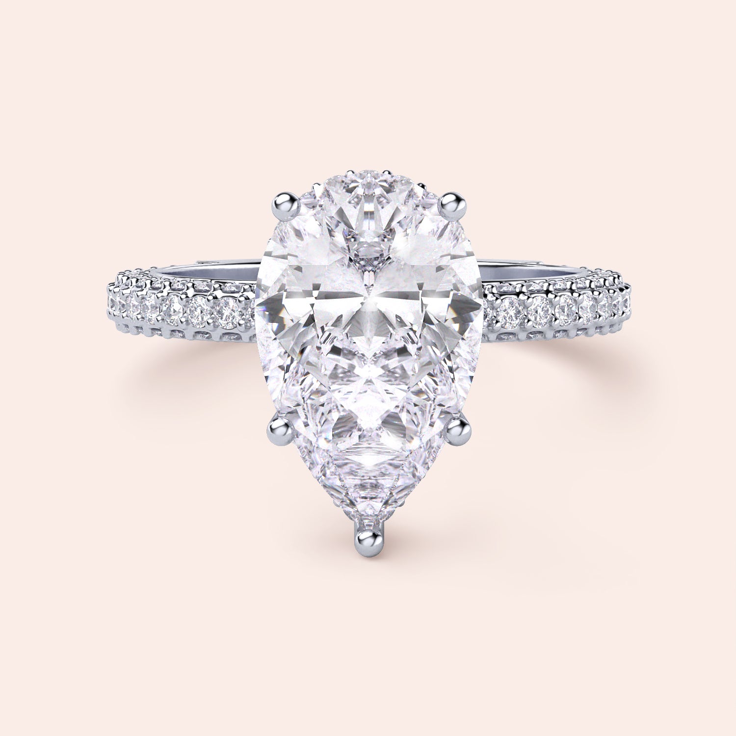 Elegant pear-shaped diamond engagement ring in 14K/18K gold or platinum, featuring a sparkling diamond-studded band.|
#14KRecycledWhiteGold
#18KRecycledWhiteGold
#Platinum