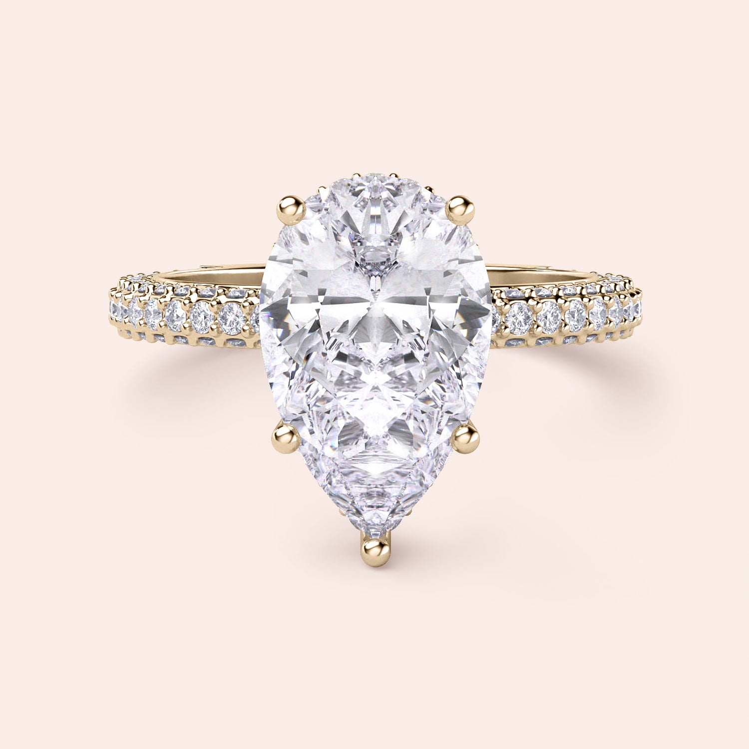 Exquisite pear-shaped diamond ring in 14K/18K gold or platinum, adorned with halo diamond accents for an elegant touch.|
#14KRecycledYellowGold
#18KRecycledYellowGold