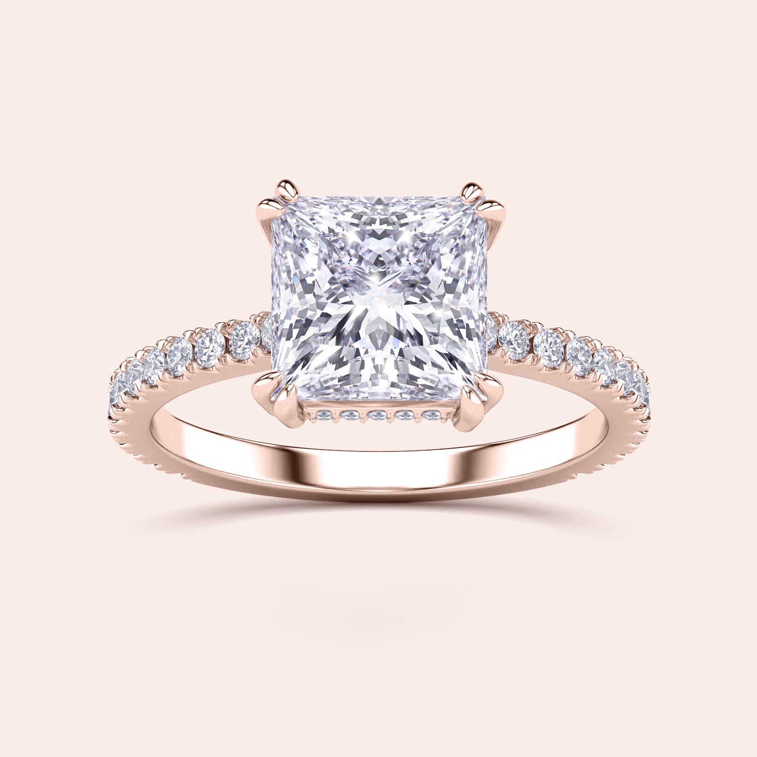 Rose Gold 14K Engagement Ring with Radiant Cut Diamond in Pave Setting, featuring an elegant hidden halo, not worn on model.|
#14KRecycledRoseGold
#18KRecycledRoseGold