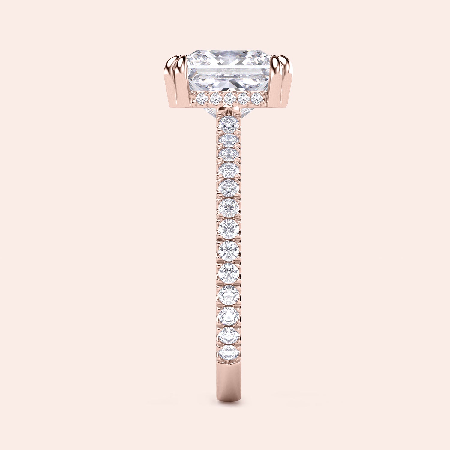 Elegant rose gold engagement ring with emerald-cut diamond and round accents, available in 14K, 18K, or platinum options.|
#14KRecycledRoseGold
#18KRecycledRoseGold