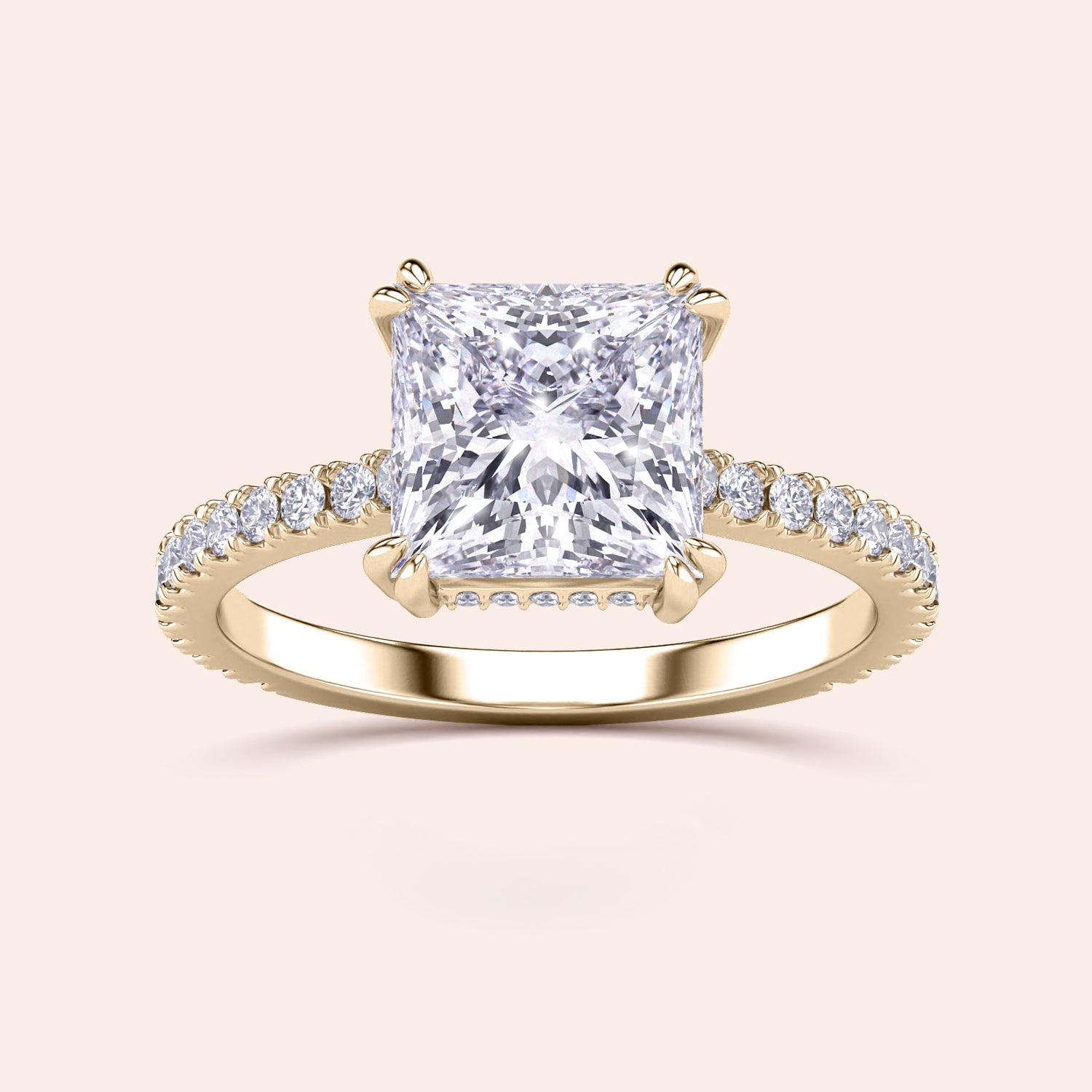 Luxury engagement ring featuring a radiant cut diamond in a 14K or 18K gold band with hidden halo and pave accents.|
#14KRecycledYellowGold
#18KRecycledYellowGold