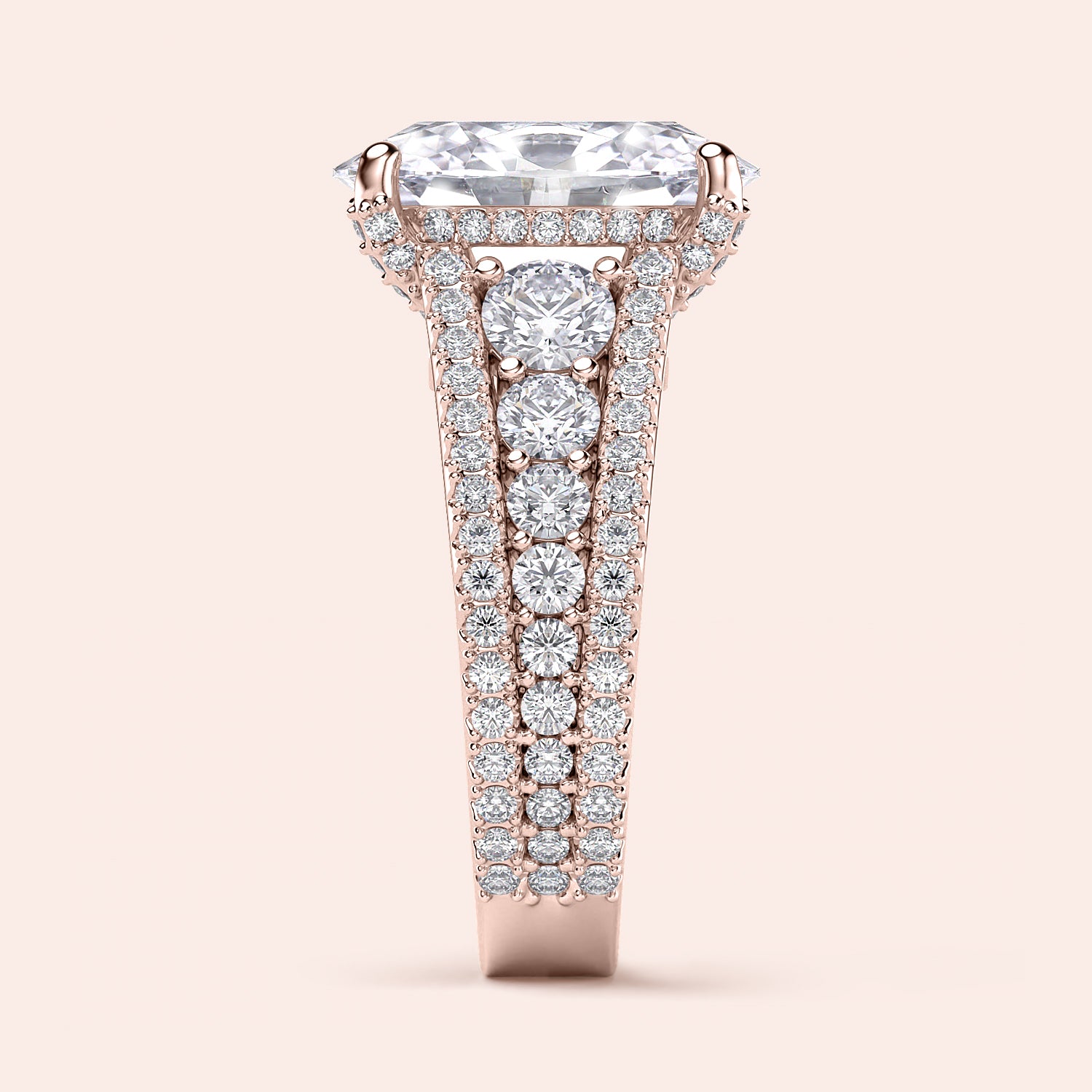 Luxurious 14K rose gold engagement ring with emerald-cut diamond, round brilliant accents, and intricate three-row band design.|
#14KRecycledRoseGold
#18KRecycledRoseGold