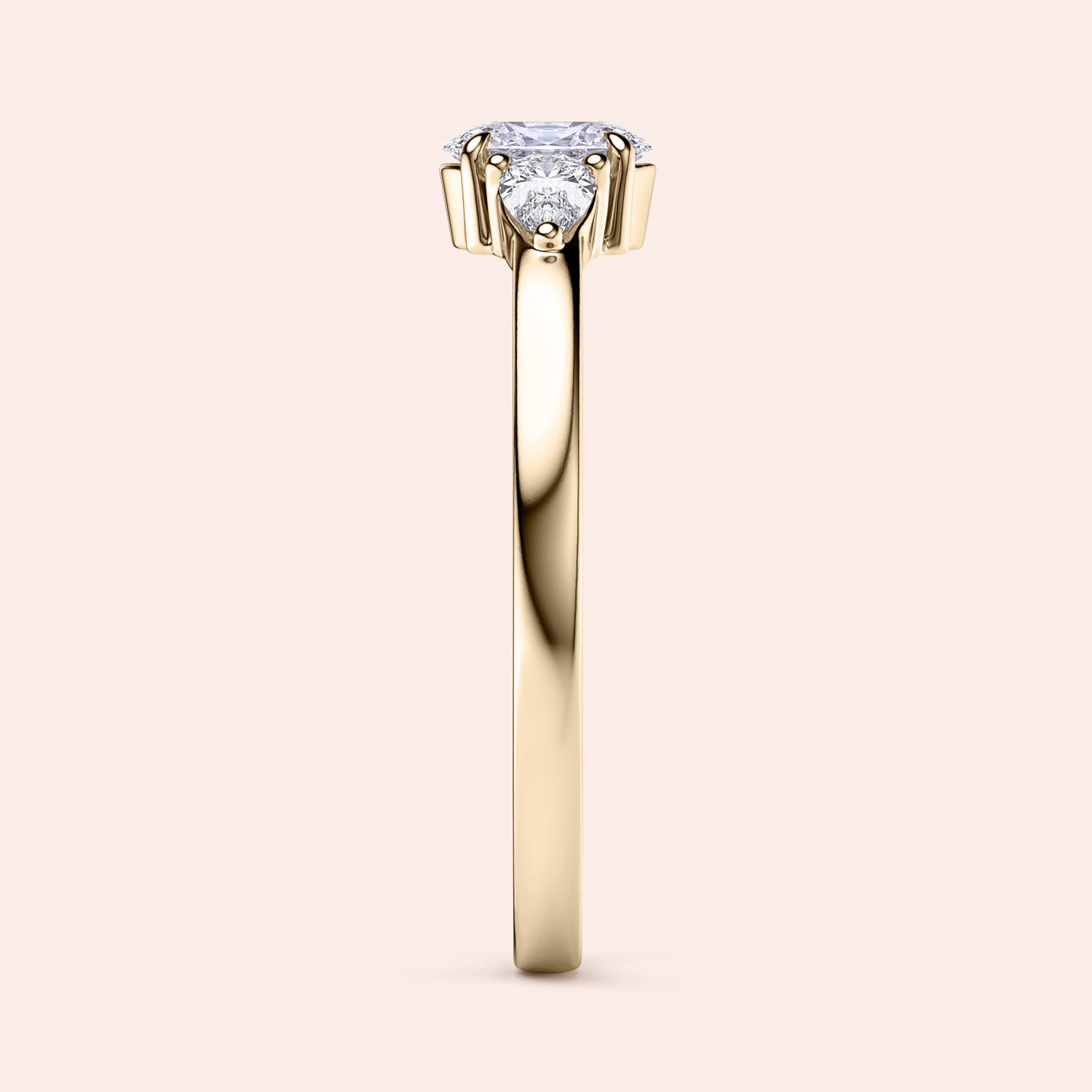 Elegant yellow gold three-stone engagement ring featuring pear stones, available in 14K or 18K gold or platinum setting.|
#14KRecycledYellowGold
#18KRecycledYellowGold