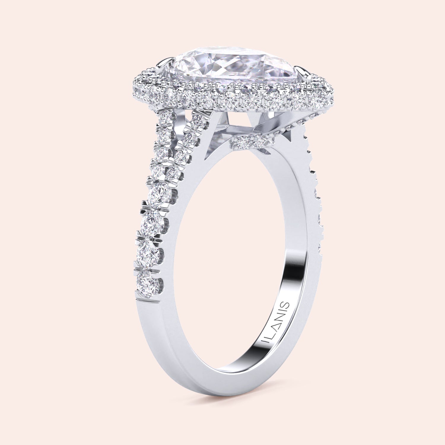 White gold pear diamond halo engagement ring with pavé band, intricate side view highlighting craftsmanship and brilliance | #14KRecycledWhiteGold #18KRecycledWhiteGold #Platinum