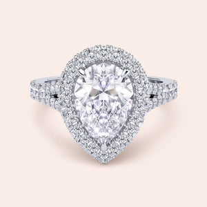 White gold pear diamond engagement ring with double halo, luxury bridal ring with refined craftsmanship and sparkle 