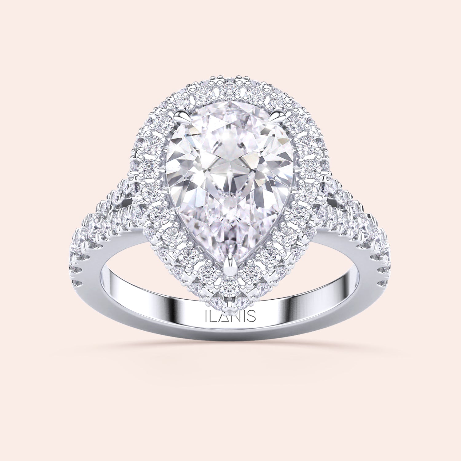 Pear cut diamond halo ring white gold, double halo pavé setting with center pear diamond and symmetrical brilliance | #14KRecycledWhiteGold #18KRecycledWhiteGold #Platinum