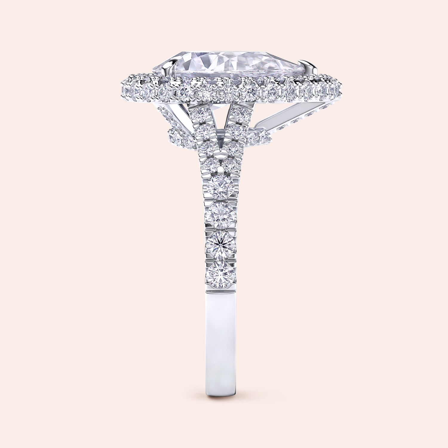 Pear shaped halo diamond ring in white gold with pavé band, elevated setting with detailed side profile and elegant structure | #14KRecycledWhiteGold #18KRecycledWhiteGold #Platinum