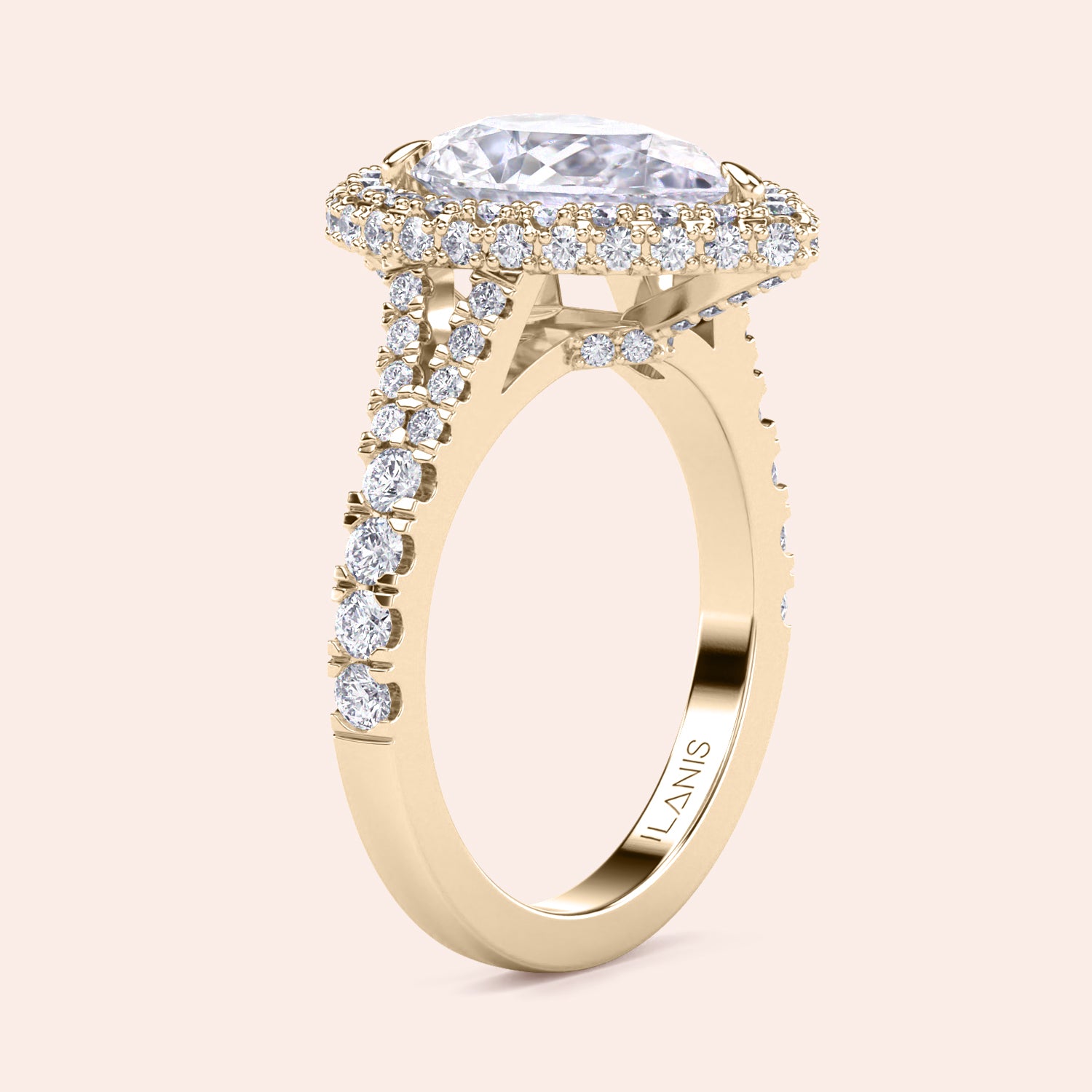 Yellow gold pear diamond halo engagement ring with pavé band, intricate side view highlighting craftsmanship and sparkle | #14KRecycledYellowGold #18KRecycledYellowGold