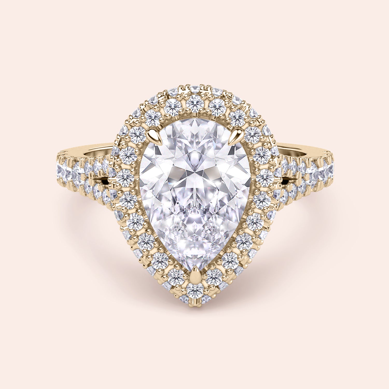 Pear shaped halo diamond ring in yellow gold with pavé band, elevated setting with detailed side profile and elegant structure | #14KRecycledYellowGold #18KRecycledYellowGold