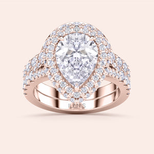 Pear shaped diamond halo bridal ring set in rose gold, engagement ring and wedding band duo, perfect for proposal 