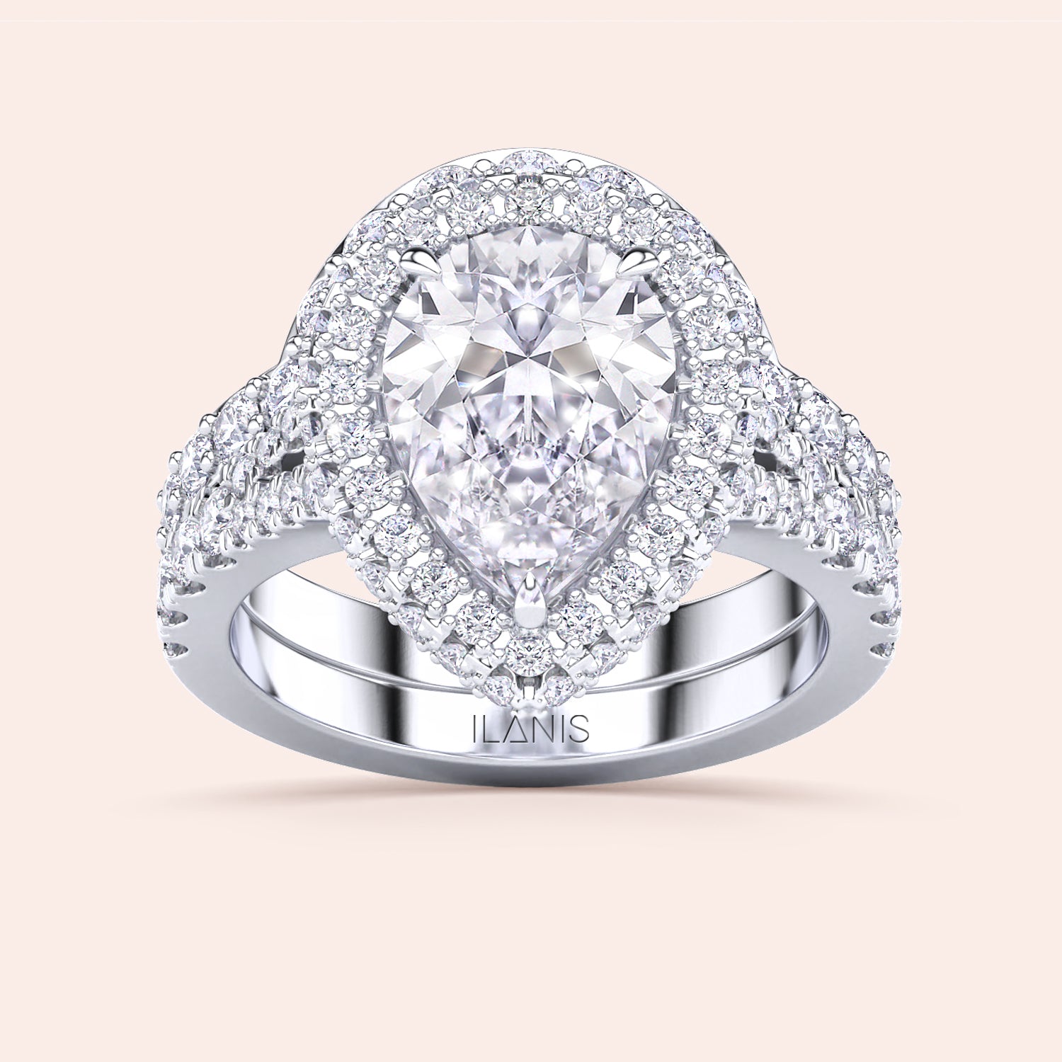 Pear shaped diamond halo bridal ring set in white gold, engagement ring and wedding band duo, perfect for proposal | #14KRecycledWhiteGold #18KRecycledWhiteGold #Platinum