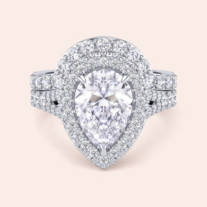 White gold pear cut diamond halo ring set, engagement ring with matching pavé wedding band, timeless bridal favorite 