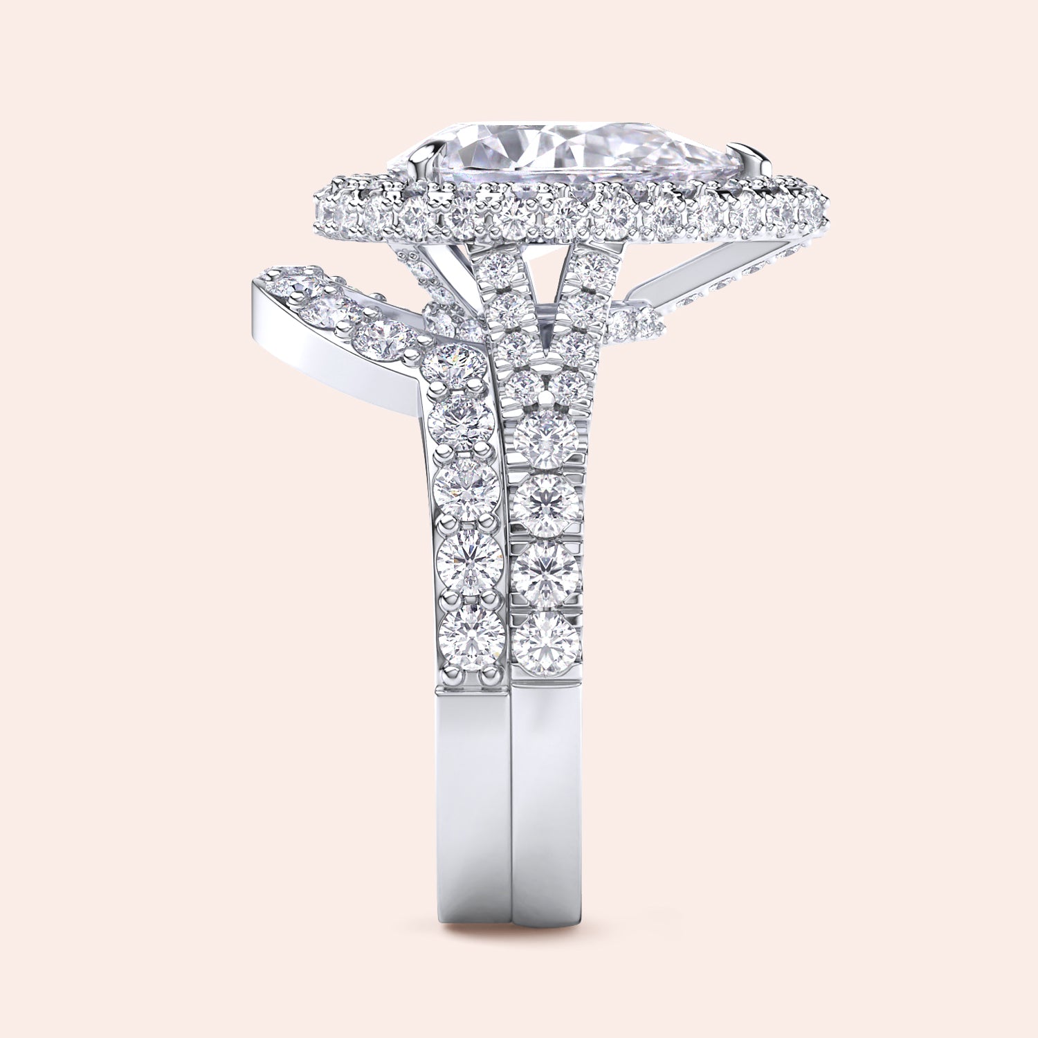 White gold pear diamond halo engagement ring set side view, pavé band with matching wedding ring, luxury bridal set | #14KRecycledWhiteGold #18KRecycledWhiteGold #Platinum