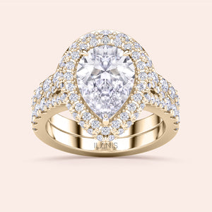 Pear shaped diamond halo bridal ring set in yellow gold, engagement ring and wedding band duo, perfect for proposal 