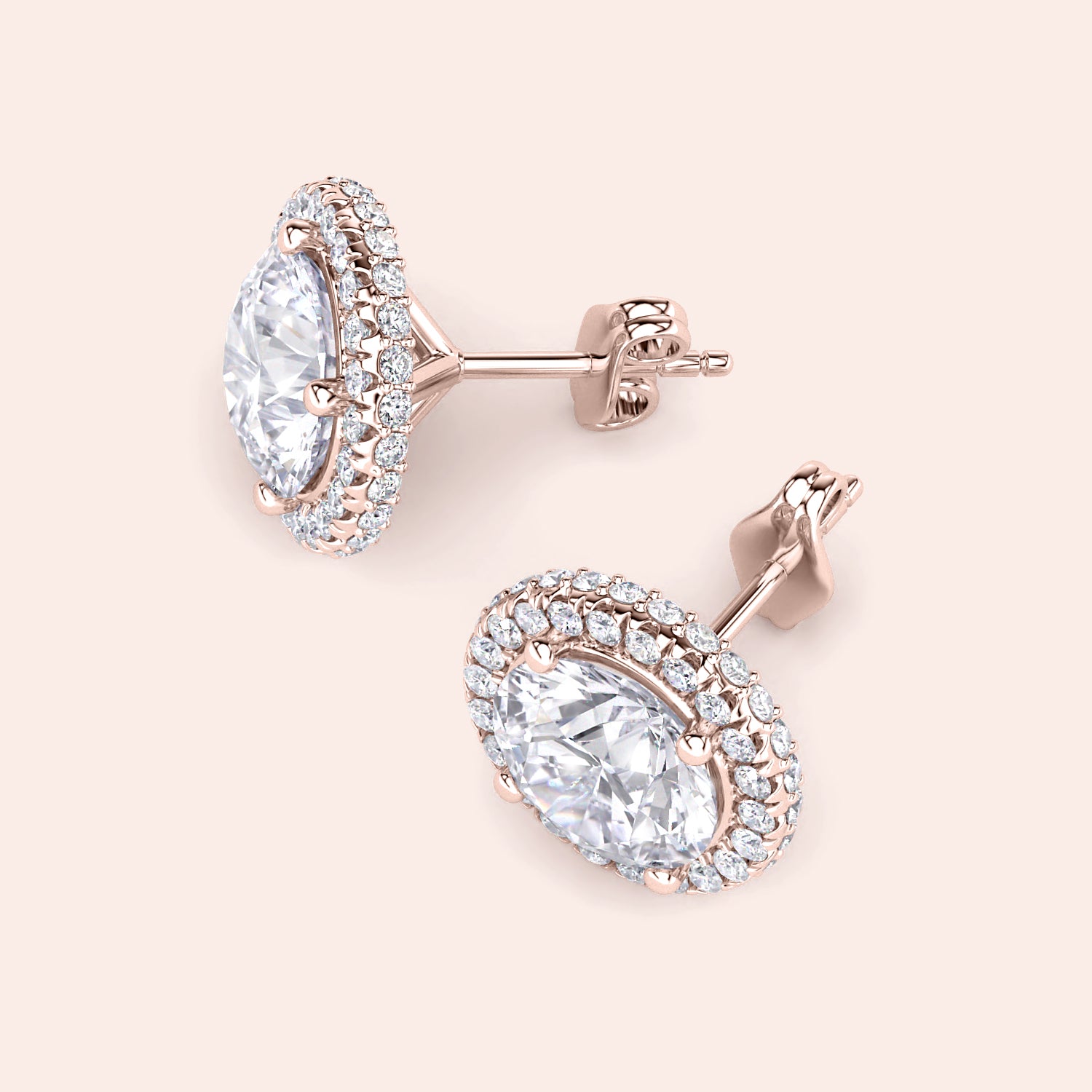 Rose gold round halo diamond stud earrings, angled view highlighting halo setting, diamond brilliance and refined craftsmanship | #14KRecycledRoseGold #18KRecycledRoseGold