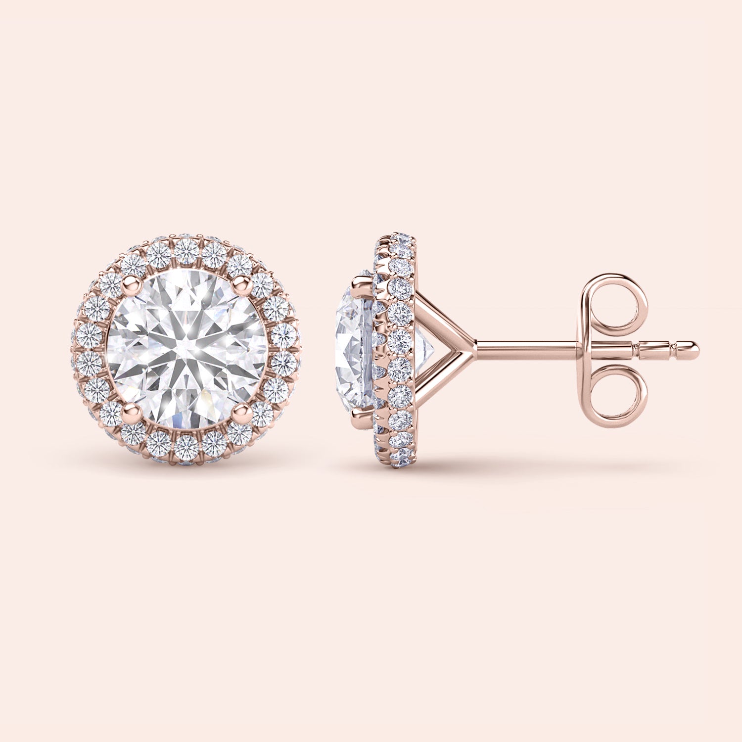 Signature round halo diamond stud earrings in rose gold, close-up front view showcasing brilliant center diamonds surrounded by a sparkling halo | #14KRecycledRoseGold #18KRecycledRoseGold