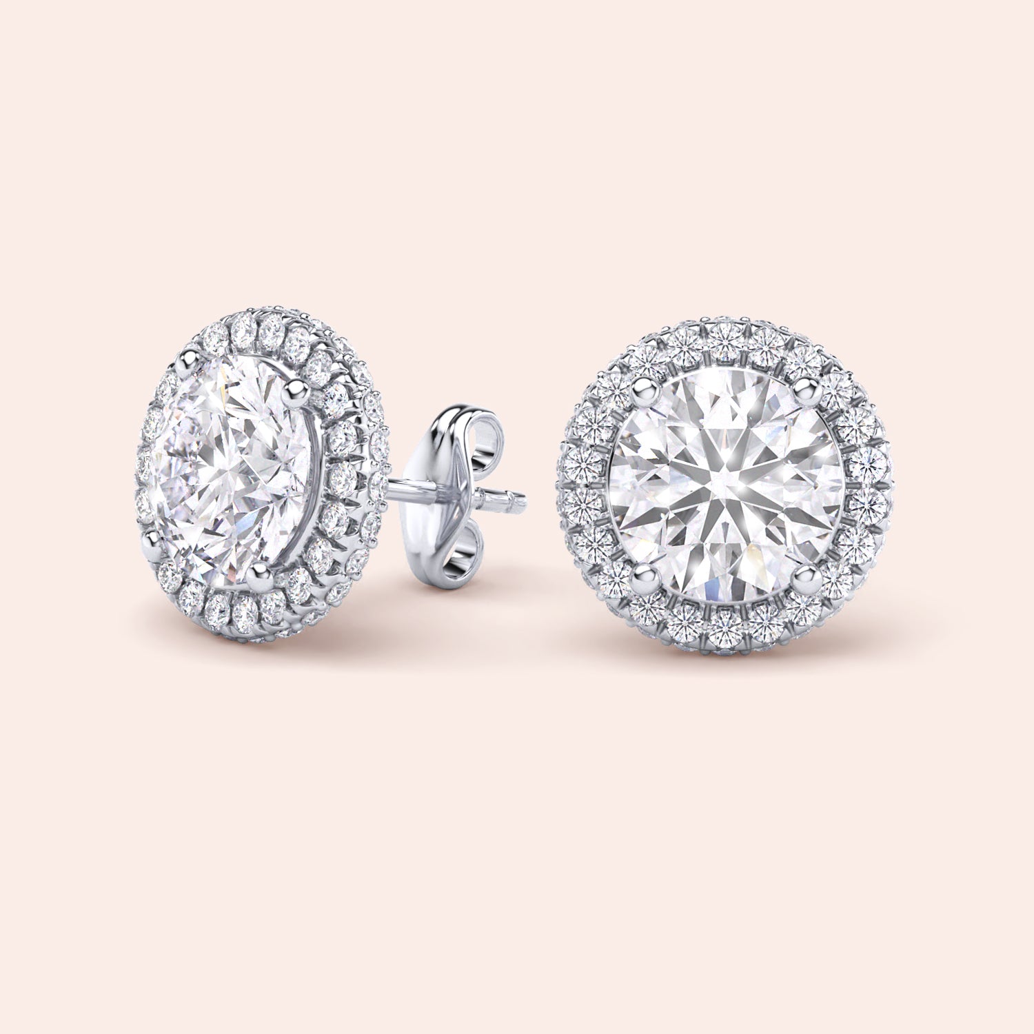 Macro close-up of white gold halo diamond stud earrings, capturing intricate setting, pavé halo details and diamond brilliance | #14KRecycledWhiteGold #18KRecycledWhiteGold #Platinum