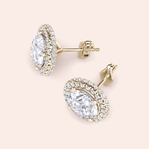 Yellow gold halo diamond stud earrings worn on ear, lifestyle close-up highlighting sparkle, elegance and everyday luxury appeal 