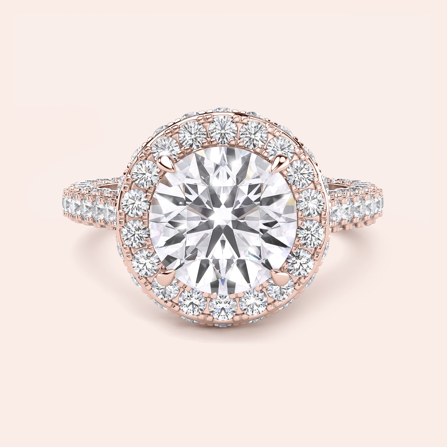 Round halo diamond engagement ring in recycled rose gold, front view with pavé band and cat claw prongs | #14KRecycledRoseGold #18KRecycledRoseGold