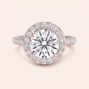 Round halo diamond engagement ring in recycled rose gold, front view with pavé band and cat claw prongs 