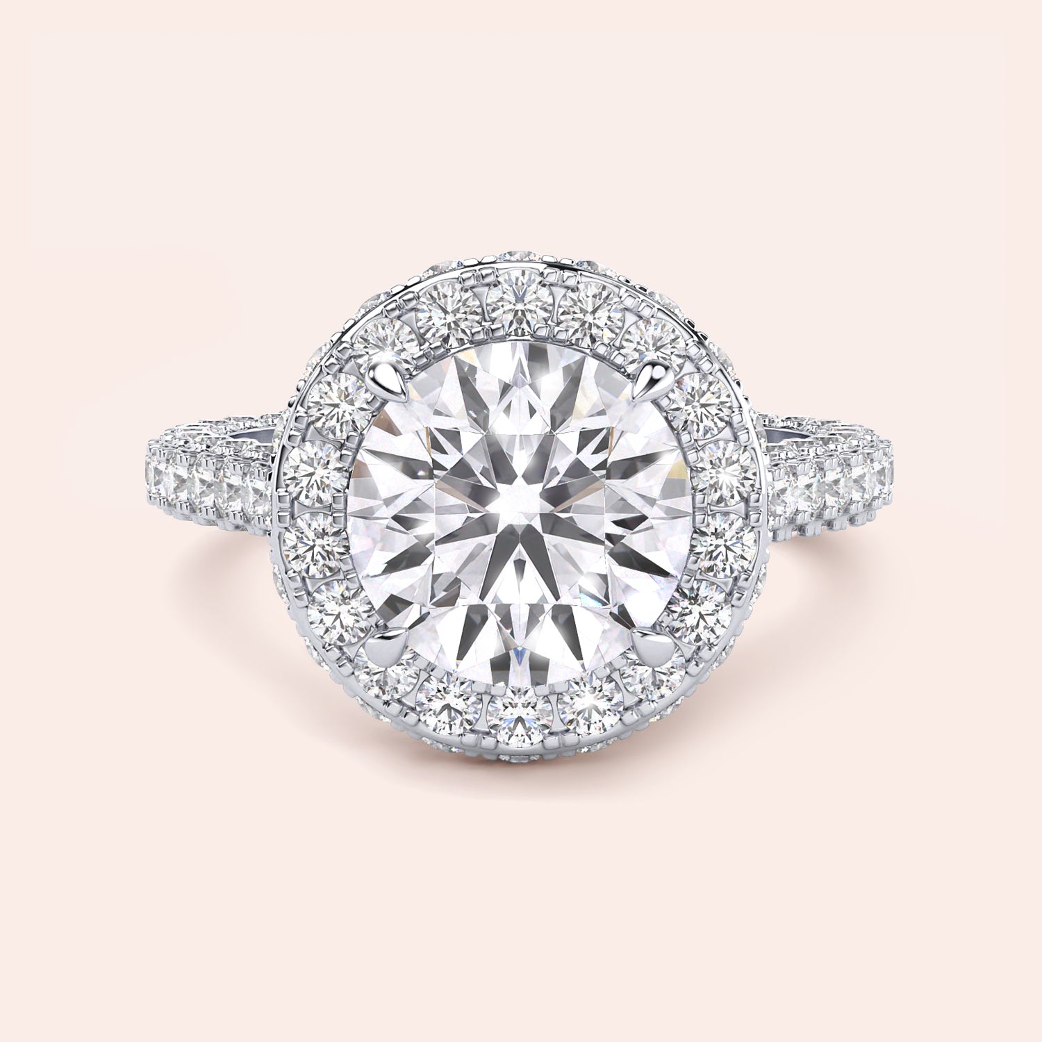 White gold round halo engagement ring, top view showing center diamond, halo and pavé shank | #14KRecycledWhiteGold #18KRecycledWhiteGold #Platinum