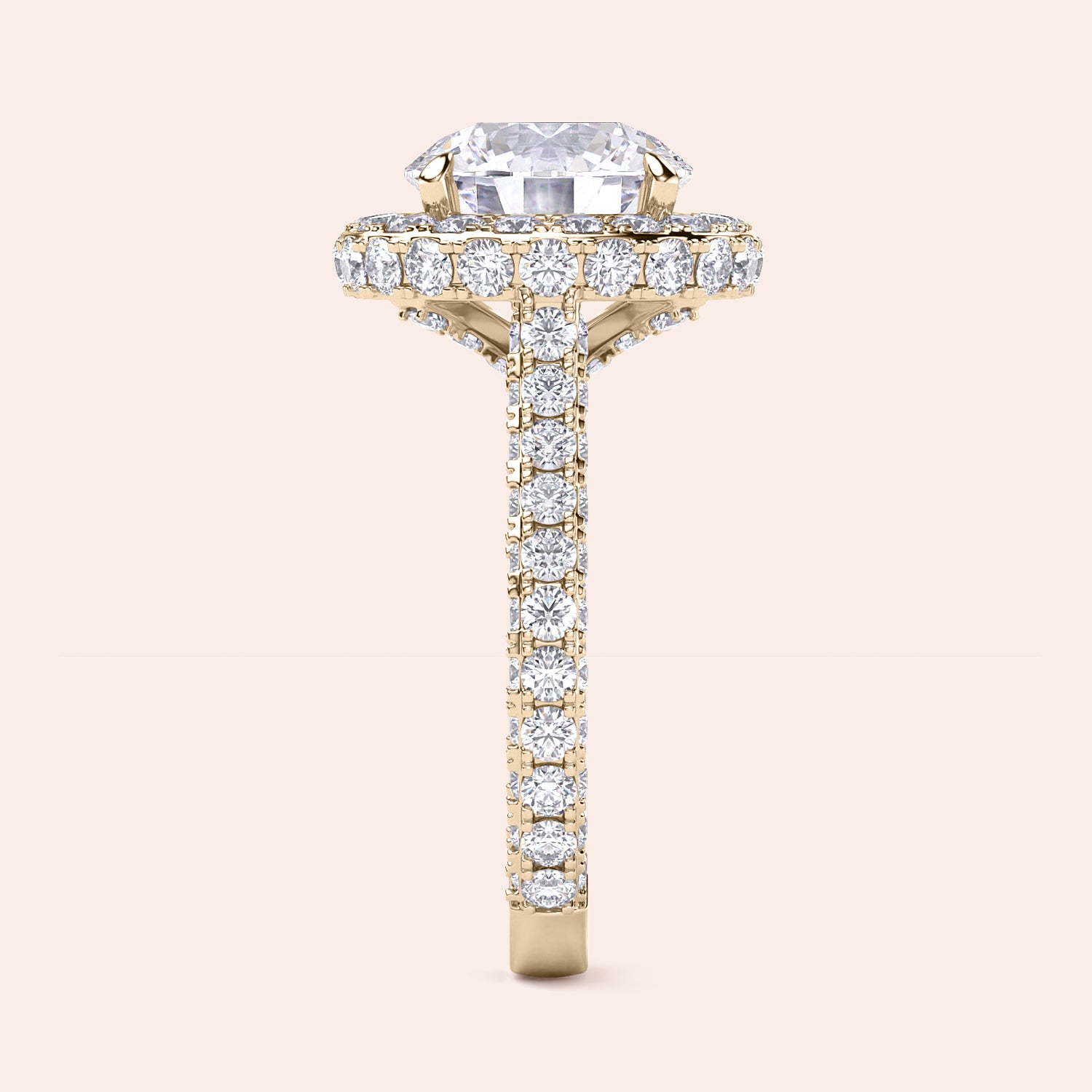 Round halo diamond engagement ring in yellow gold, side profile showing elevated setting and pavé band | #14KRecycledYellowGold #18KRecycledYellowGold