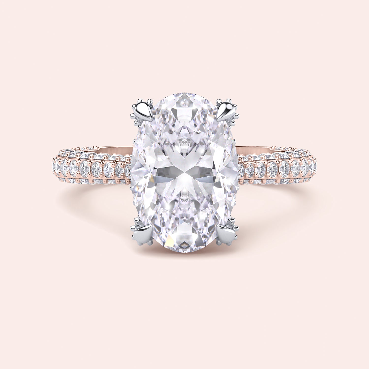 Two tone oval diamond engagement ring, front view with white gold prongs and rose gold pavé shank | #14KRecycledRose/WhiteGold #18KRecycledRose/WhiteGold