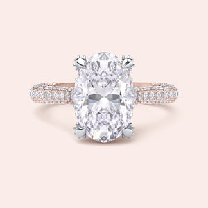 Two tone oval diamond engagement ring, front view with white gold prongs and rose gold pavé shank 