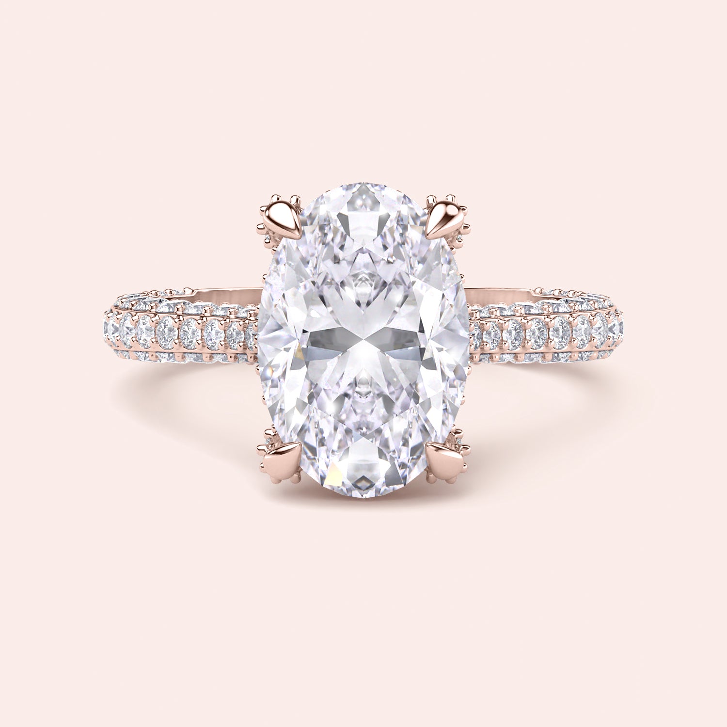 Oval diamond engagement ring in rose gold, top view with pavé band and solitaire setting | #14KRecycledRoseGold #18KRecycledRoseGold