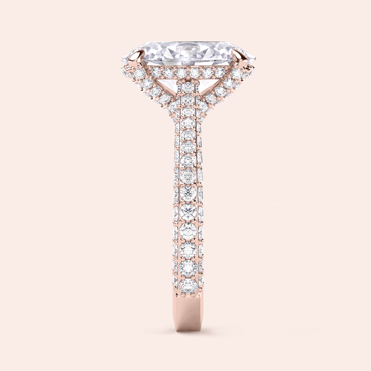 Rose gold oval diamond engagement ring, side view showing elevated hidden halo and pavé shank | #14KRecycledRoseGold #18KRecycledRoseGold