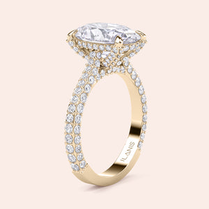 Oval diamond engagement ring in yellow gold, angled side view with pavé band and hidden halo detail 